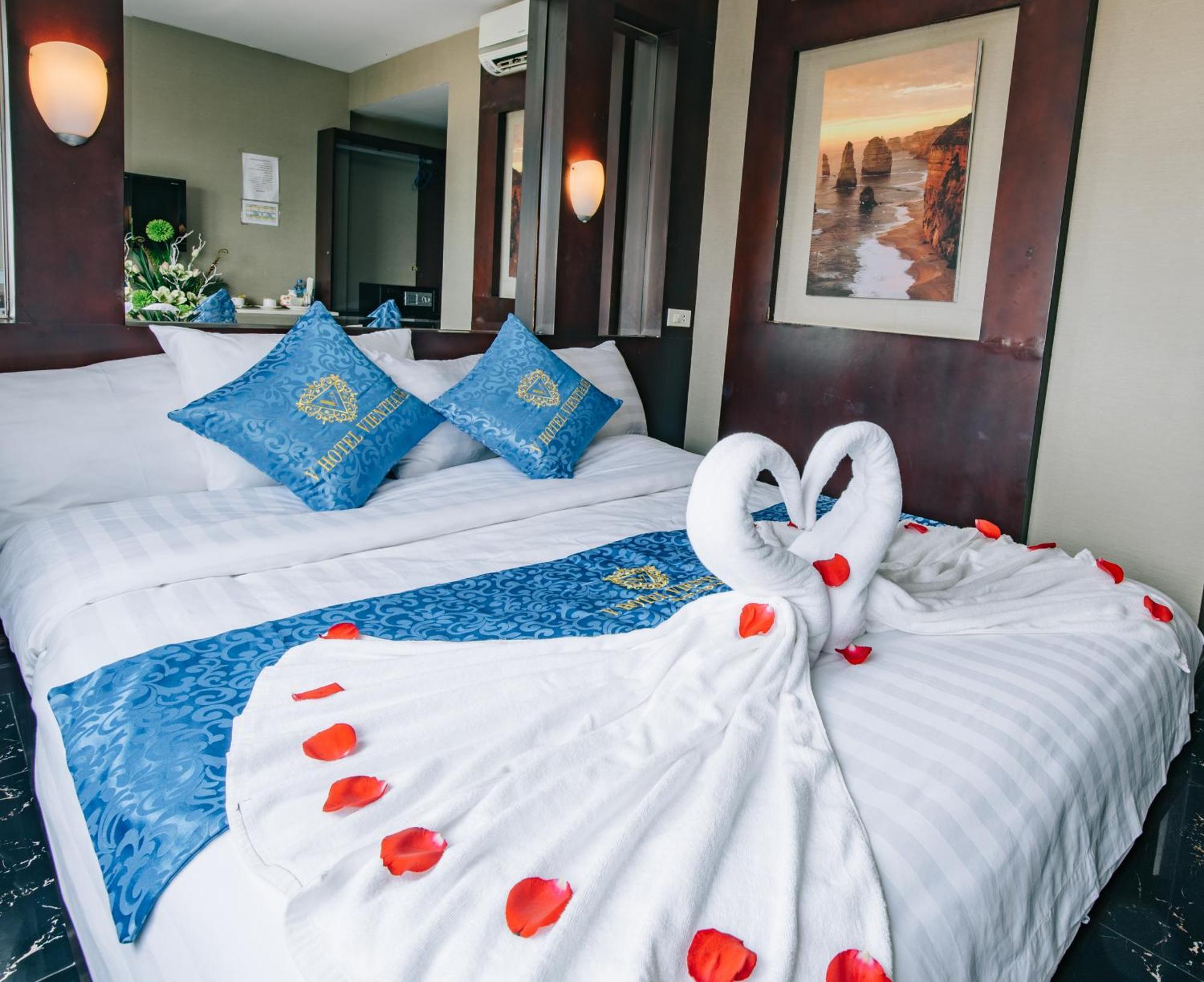 V Hotel Vientiane Quarto foto
